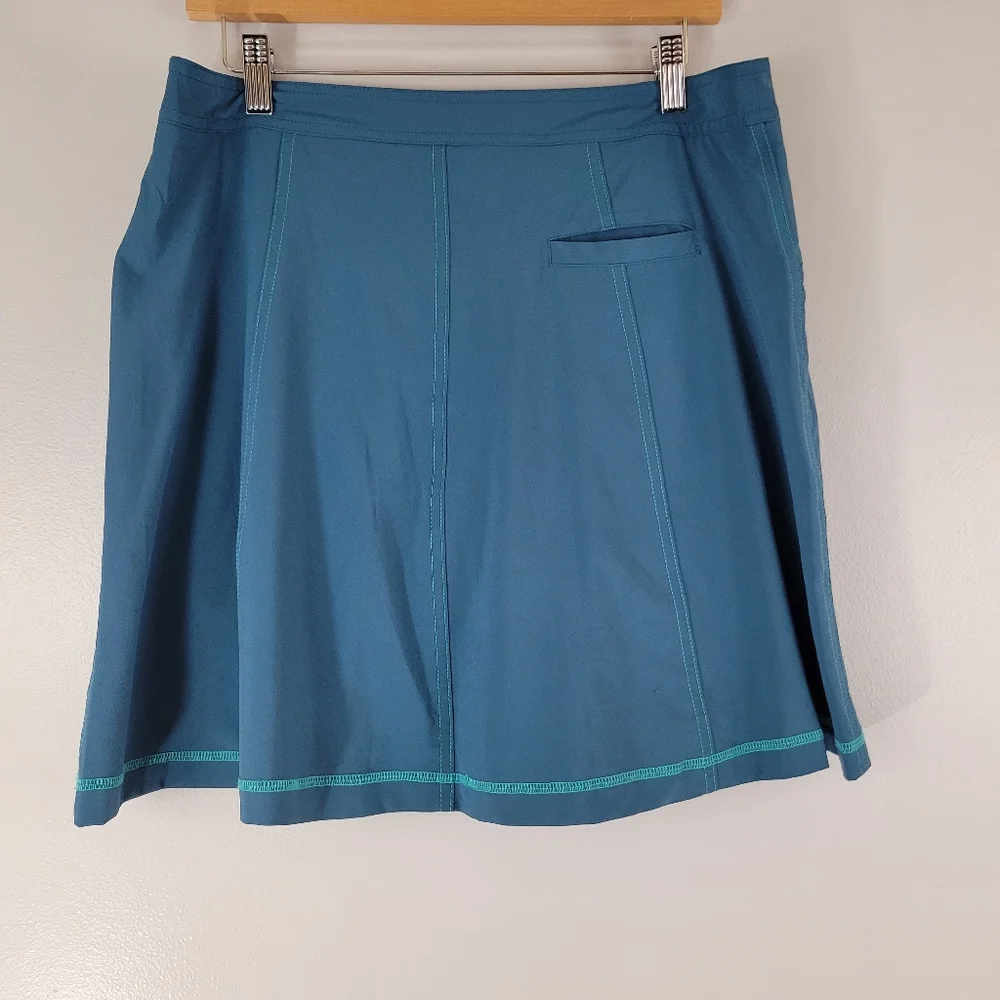 TITLE NINE Swingtastic teal Nimblene stretch UPF 50 athletic quick-dry skort